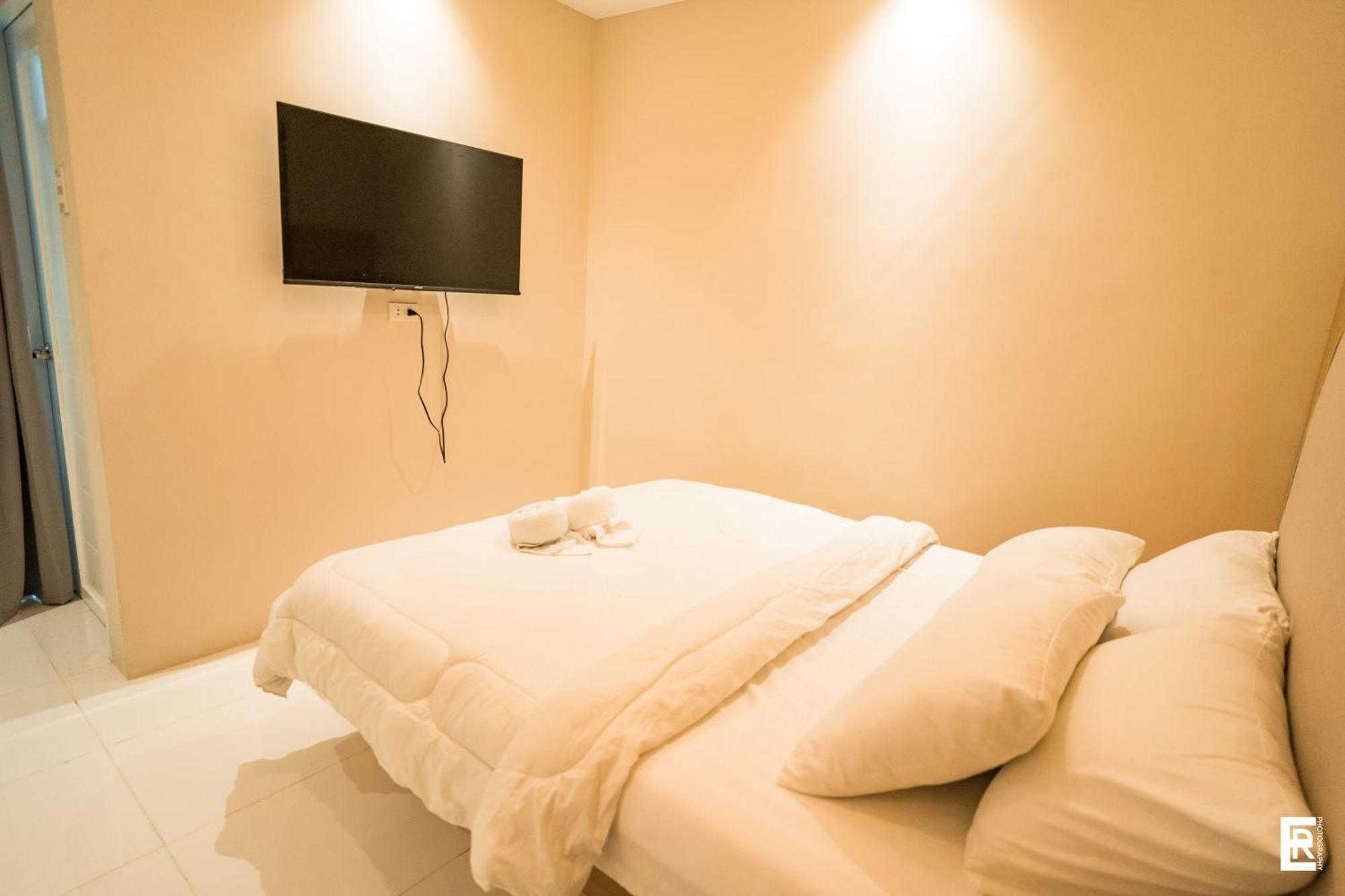 Bernese Resort Hotel Powered By Cocotel Ligao Quarto foto