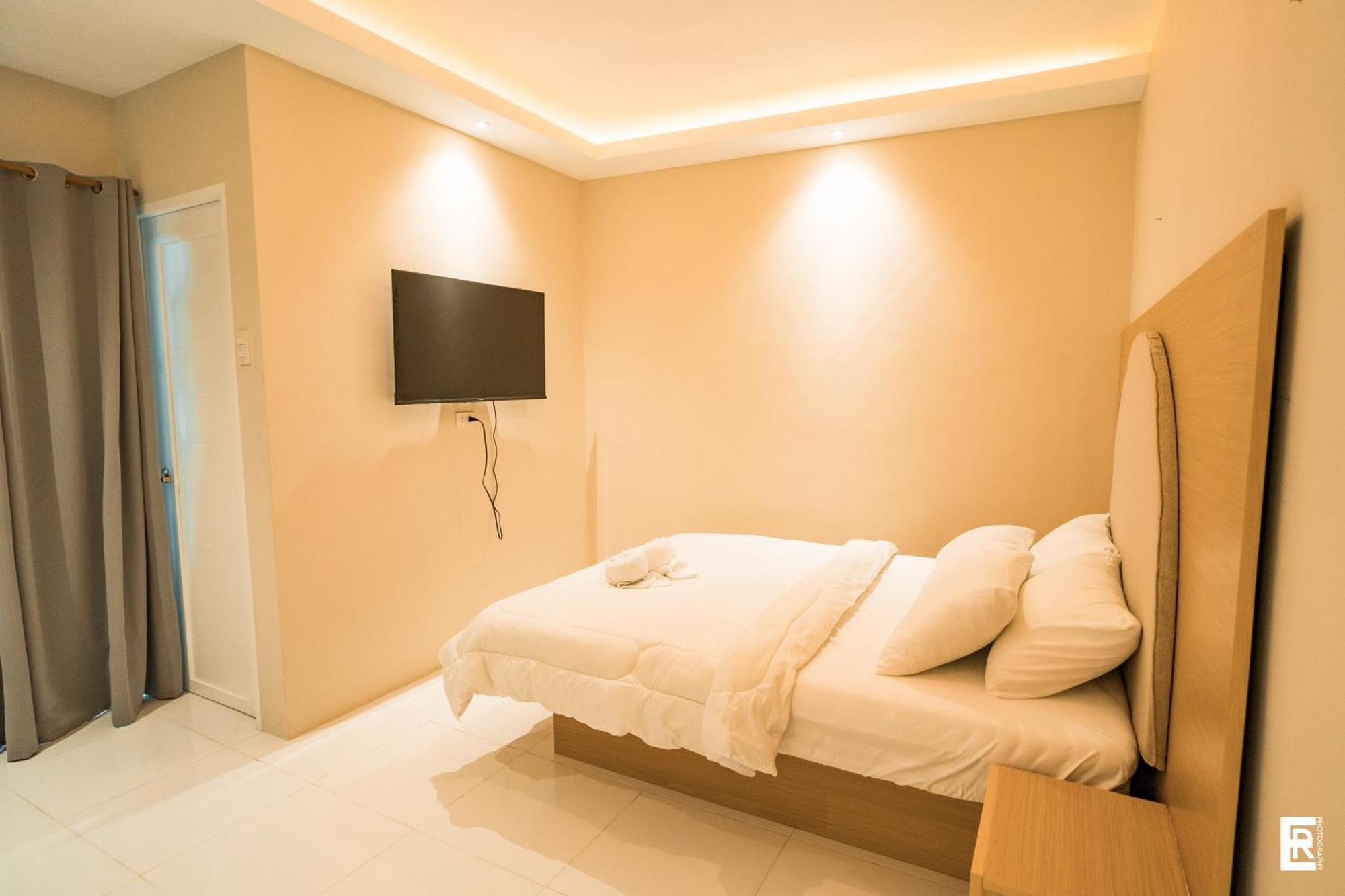 Bernese Resort Hotel Powered By Cocotel Ligao Quarto foto
